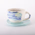 products/La_Taza_De_La_Felicidad_PlatoMeltMentaTazaMitaG.jpg